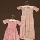 TWO PINK TODDLERS&#039; DRESSES, 1820-1840