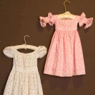 TWO TODDLERS&#039; CALICO DRESSES, 1830-1840