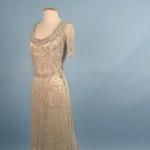 CRYSTAL BEADED TRAINED EVENING GOWN, c. 1909