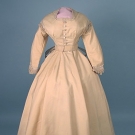 CREAM WOOL WEDDING GOWN, LATE 1860s