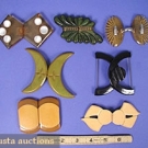 7 BAKELITE CLASPS, 1930-1940s
