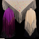 ONE REVERSIBLE HAND EMBROIDERED &amp; TWO PLAIN PIANO SHAWLS, EARLY 20TH C