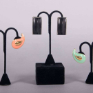 THREE YSL STATEMENT EARCLIPS, PARIS, 1970-1980s