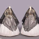TWO BLACK CHANTILLY LACE SHAWLS, 1860s