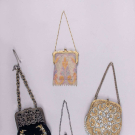 FOUR MESH OR EMBROIDERED PURSES, 1910s-1930s