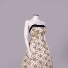 EMBROIDERED SATIN PEACOCK HEM EVENING DRESS, C. 1957