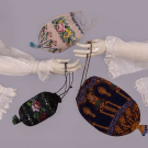 THREE BEADED RETICULES &amp; TWO SETS EMBROIDERED UNDERSLEEVES, 1840s - 1870s