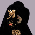 SIX FIGURAL STATEMENT BROOCHES, MID 20TH C