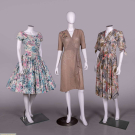 THREE PRINTED COTTON OR SILK DAY DRESSES, 1940s - 1950s