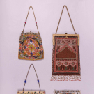 THREE BEADED PURSES &amp; ONE EGYPTIAL REVIVAL BEADED PANEL, 1920s