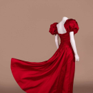 RED EVENING GOWN WITH STATEMENT SLEEVES, 1980S