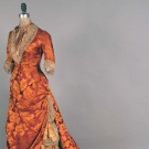 PURPLE &amp; ORANGE SILK BUSTLE GOWN, 1878-1883
