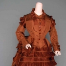 BROWN SILK BUSTLE DRESS, EARLY 1870s
