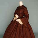 CHOCOLATE SILK BROCADE DAY DRESS, 1850s