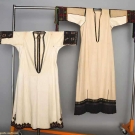TWO EMBROIDERED REGIONAL DRESSES, c. 1900