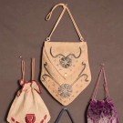 FOUR CLOTH HANDBAGS, 1910-1930s