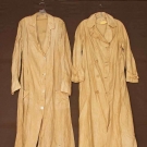 2 LADIES' TAN LINEN DUSTERS, EARLY 20TH C