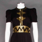 BRASS TRIMMED BLACK GOWN, c. 1938