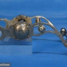 ENGRAVED SILVER OVERLAY WESTERN BIT, c. 1900