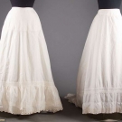 TWO TRAINED BUSTLE PETTICOATS, 1870-1880s