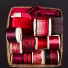 LARGE LOT OF DECORATIVE RED RIBBONS, EARLY 20th C.