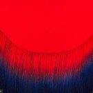 CIRCULAR RED FRINGED SHAWL, EARLY 20TH C.