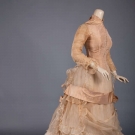 TAN SILK &amp; ORGANDY BUSTLE GOWN, 1870s