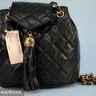 CHANEL BLACK LAMBSKIN PURSE, 1980s