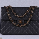 AUTHENTICATED CHANEL JUMBO CAVIAR QUILTED BAG, PARIS, 2000-2002