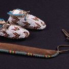 CHILD’S MOCCASINS &amp; BEADED KNIFE SHEATH, LAKOTA SIOUX, LATE 19TH-EARLY 20TH