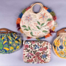 FOUR EMBROIDERED SOUVENIR BAGS, 1930-1950s