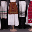 SIX REGIONAL APRONS, EASTERN EUROPE, MID 20TH C