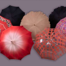 ONE COURRÉGES &amp; LOT OF UNLABELED UMBRELLAS, MID-LATE 20TH C