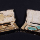 TWO GUILLOCHÉ ENAMEL TRAVELING TOILETS, EARLY 20TH C