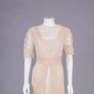 SOUTACHE EMBROIDERED NET OVERDRESS, c. 1911