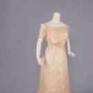 TAPE LACE &amp; CHAINSTITCH EMBROIDERED EVENING GOWN, c. 1912