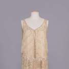 HEAVILY BEADED CREPE DE CHINE EVENING DRESS, MID 1920s