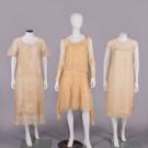 THREE EMBROIDERED OR CUTWORK AFTERNOON DRESSES, EARLY-MID 1920s