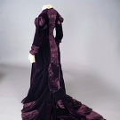 PURPLE VELVET TRAINED GOWN, LATE 1870s